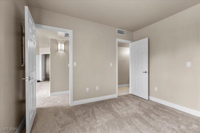 8000 Badura Ave Unit 2028, Las Vegas, NV 89113 - unfurnished bedroom featuring carpet floors and baseboards