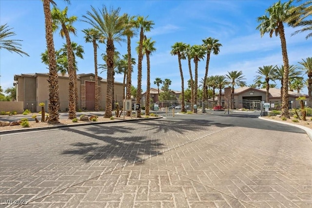 8000 Badura Ave Unit 2028, Las Vegas, NV 89113 - view of street with curbs, a gate, and a gated entry