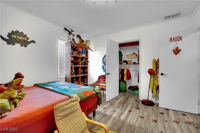 4419 Lorna Pl, Las Vegas, NV 89107 - bedroom with wood finished floors and a closet