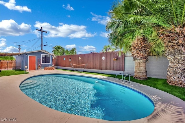 4419 Lorna Pl, Las Vegas, NV 89107 - view of pool with a fenced backyard and an outdoor structure