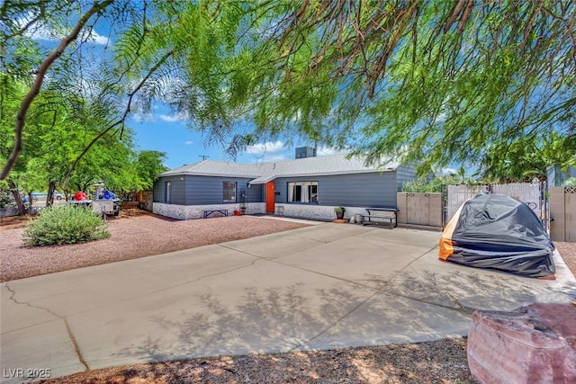 4419 Lorna Pl, Las Vegas, NV 89107 - back of property featuring a gate and a patio area