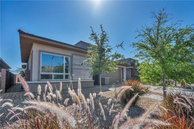 6684 Regency Stone Way, Las Vegas, NV 89148 - view of home's exterior featuring stucco siding