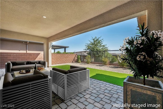 6684 Regency Stone Way, Las Vegas, NV 89148 - fenced backyard featuring a patio area and an outdoor hangout area