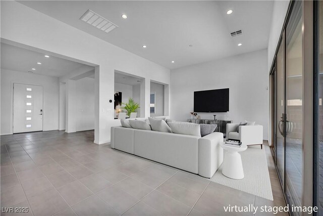 6684 Regency Stone Way, Las Vegas, NV 89148 - tiled living area featuring recessed lighting
