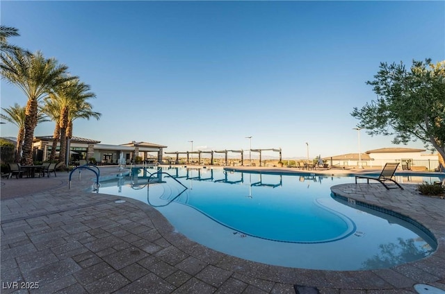 6684 Regency Stone Way, Las Vegas, NV 89148 - community pool featuring a patio area