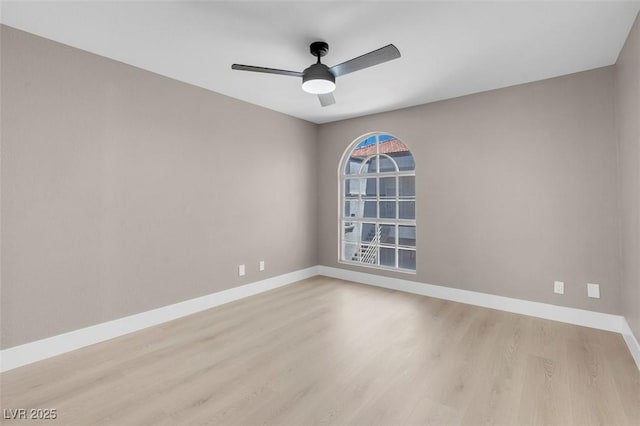 3150 Soft Breezes Dr Unit 2186, Las Vegas, NV 89128 - empty room with wood finished floors, ceiling fan, and baseboards
