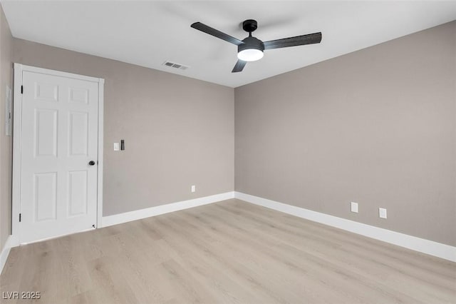 3150 Soft Breezes Dr Unit 2186, Las Vegas, NV 89128 - spare room featuring a ceiling fan, light wood-style floors, and baseboards
