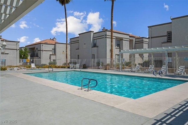 3150 Soft Breezes Dr Unit 2186, Las Vegas, NV 89128 - community pool featuring a patio area, a pergola, and a residential view