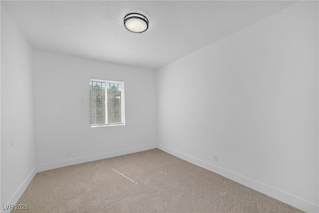 1608 E Mcdonald Ave, North Las Vegas, NV 89030 - carpeted spare room with baseboards