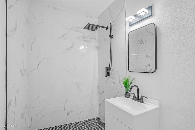 1608 E Mcdonald Ave, North Las Vegas, NV 89030 - bathroom with vanity and a marble finish shower