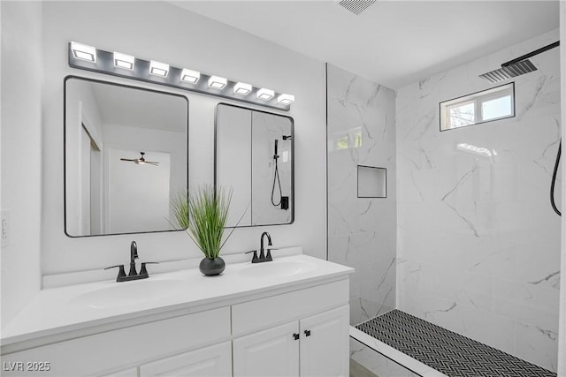 1608 E Mcdonald Ave, North Las Vegas, NV 89030 - full bath featuring double vanity, a marble finish shower, and a ceiling fan