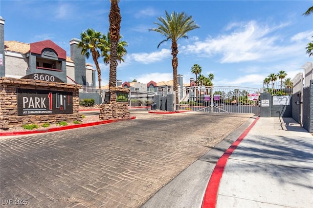 8600 W Charleston Blvd Unit 2085, Las Vegas, NV 89117 - view of street featuring a gate, curbs, and a gated entry