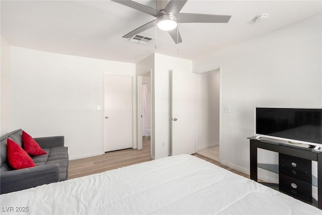 8600 W Charleston Blvd Unit 2085, Las Vegas, NV 89117 - bedroom featuring wood finished floors, baseboards, and a ceiling fan