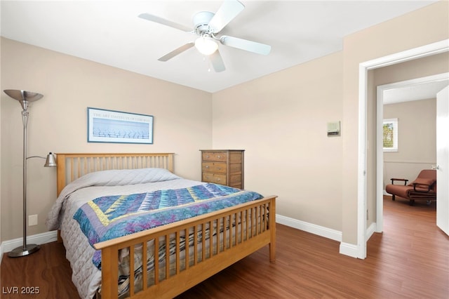6612 Elton Ave, Las Vegas, NV 89107 - bedroom featuring baseboards, wood finished floors, and ceiling fan