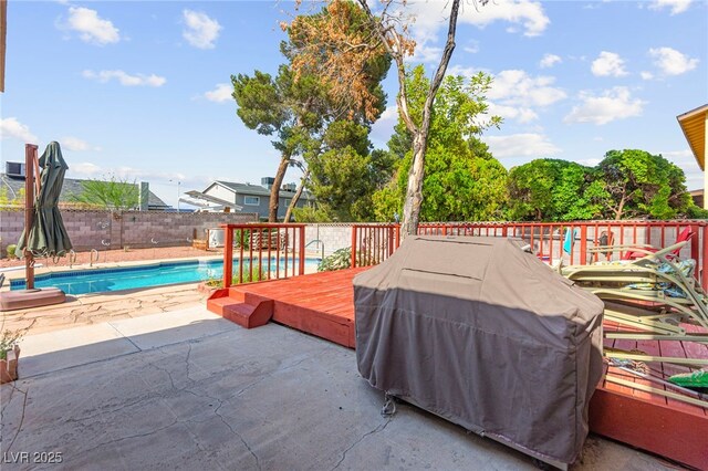 6612 Elton Ave, Las Vegas, NV 89107 - wooden deck featuring a patio area and a fenced backyard