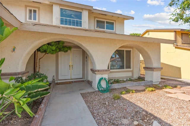6612 Elton Ave, Las Vegas, NV 89107 - doorway to property with stucco siding