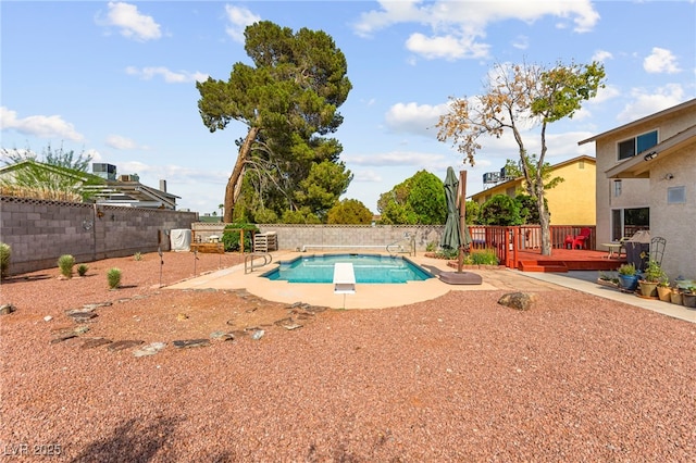 6612 Elton Ave, Las Vegas, NV 89107 - view of swimming pool featuring a deck, a fenced backyard, and a patio