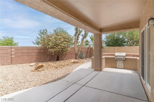 2056 Bay Thrush Way N, Las Vegas, NV 89084 - fenced backyard with a patio area and grilling area