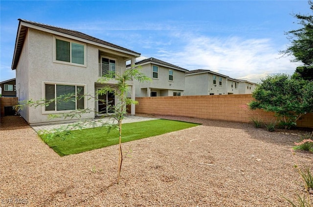 3760 Paseo De Paz Ave, Las Vegas, NV 89115 - back of house with stucco siding, a fenced backyard, a residential view, and a patio area