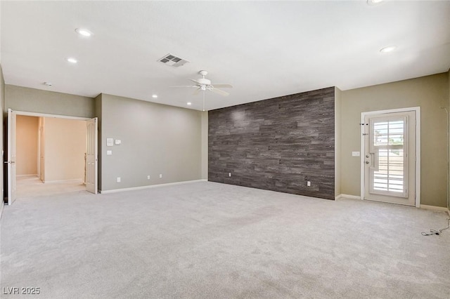 8113 Gothic Ave, Las Vegas, NV 89117 - unfurnished room with an accent wall, ceiling fan, recessed lighting, carpet flooring, and baseboards
