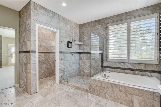 8113 Gothic Ave, Las Vegas, NV 89117 - full bath with a bath, a shower stall, and tile patterned flooring