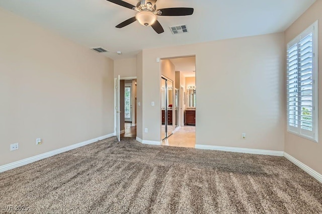 4311 Fiore Bella Blvd, Las Vegas, NV 89135 - spare room featuring light colored carpet and ceiling fan