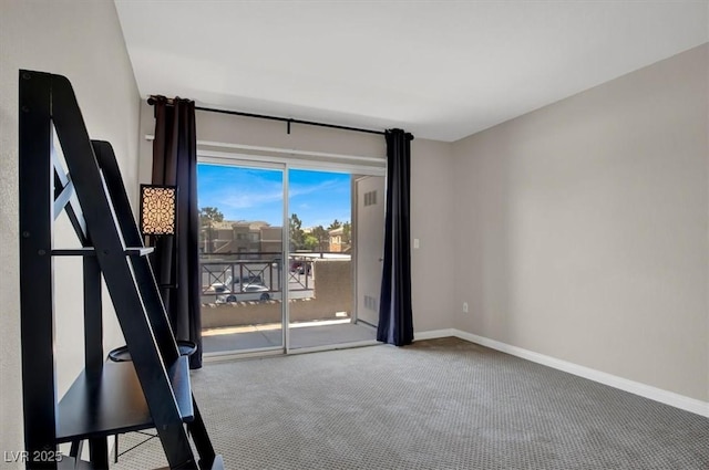 8070 W Russell Rd Unit 2052, Las Vegas, NV 89113 - carpeted spare room featuring baseboards