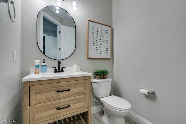 7194 Sage Wren Ct, Las Vegas, NV 89148 - bathroom with vanity, toilet, and baseboards