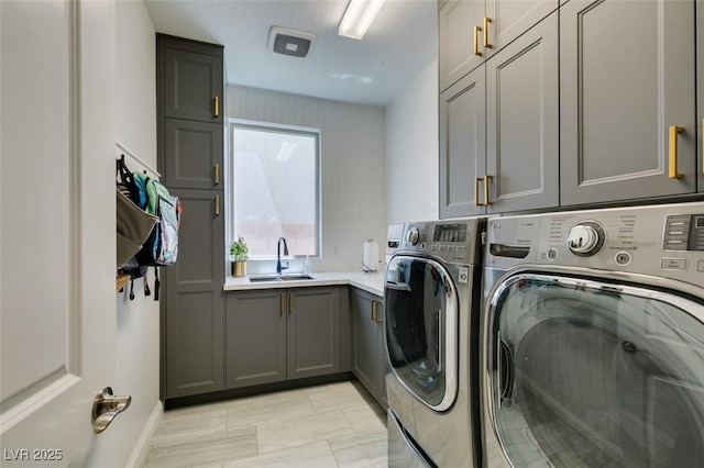 7194 Sage Wren Ct, Las Vegas, NV 89148 - laundry room featuring washing machine and clothes dryer and cabinet space