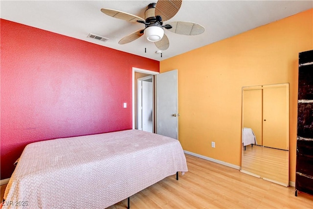 6058 Grape Blossom Ave, Las Vegas, NV 89142 - bedroom with light wood-style flooring and ceiling fan