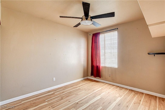 6058 Grape Blossom Ave, Las Vegas, NV 89142 - spare room with light wood-style flooring and a ceiling fan