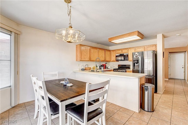 6058 Grape Blossom Ave, Las Vegas, NV 89142 - dining room featuring light tile patterned floors and a chandelier