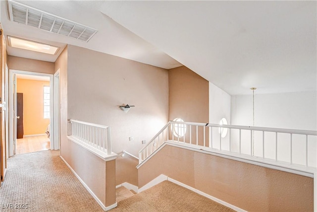 6058 Grape Blossom Ave, Las Vegas, NV 89142 - hall with an upstairs landing and carpet