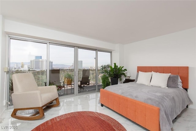 3111 Bel Air Dr Unit 12G, Las Vegas, NV 89109 - bedroom with light marble finish flooring and access to outside