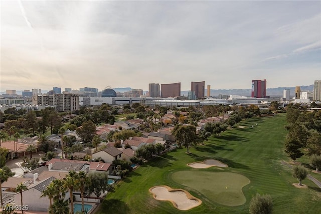 3111 Bel Air Dr Unit 12G, Las Vegas, NV 89109 - aerial view of property and surrounding area featuring city skyline and a local golf course
