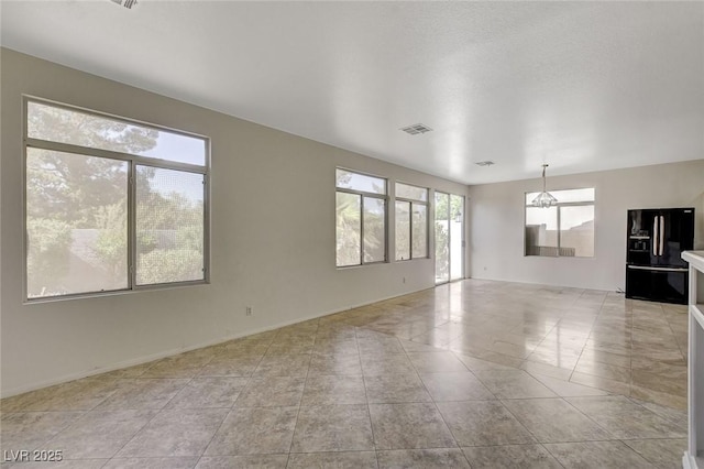 1408 Reebok Ter, Henderson, NV 89014 - unfurnished room featuring light tile patterned floors and baseboards