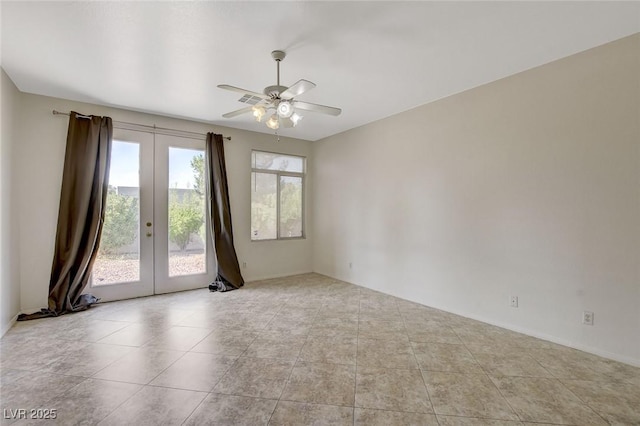 1408 Reebok Ter, Henderson, NV 89014 - unfurnished room featuring french doors, ceiling fan, tile patterned flooring, and baseboards