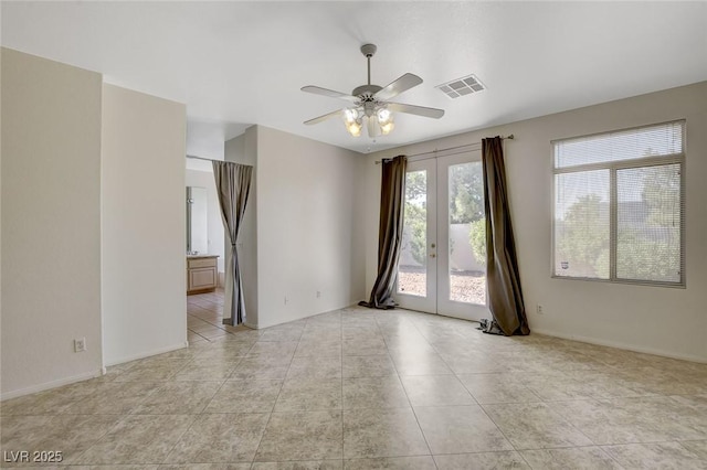 1408 Reebok Ter, Henderson, NV 89014 - empty room featuring ceiling fan, french doors, and light tile patterned flooring