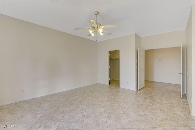 1408 Reebok Ter, Henderson, NV 89014 - spare room with a ceiling fan and light tile patterned flooring