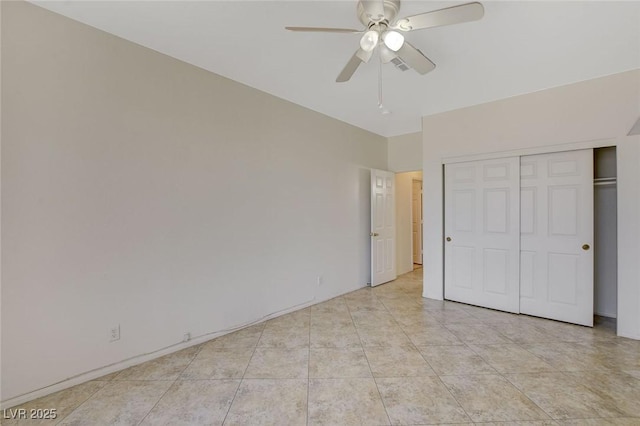 1408 Reebok Ter, Henderson, NV 89014 - unfurnished bedroom with a closet, ceiling fan, and light tile patterned floors