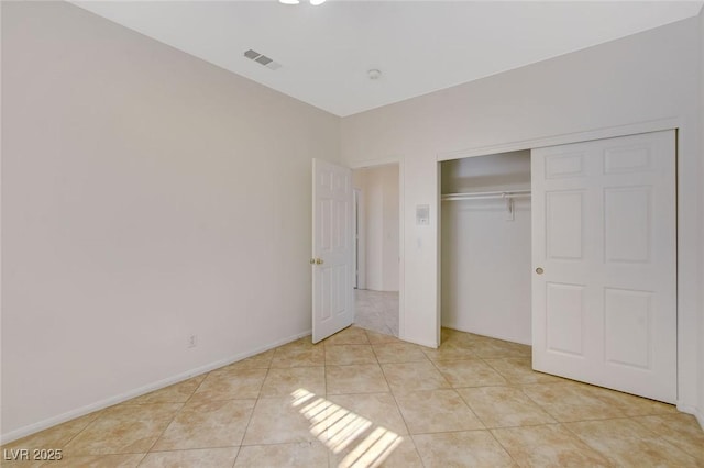 1408 Reebok Ter, Henderson, NV 89014 - unfurnished bedroom featuring light tile patterned floors and a closet
