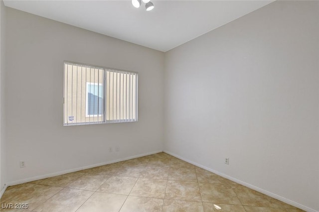 1408 Reebok Ter, Henderson, NV 89014 - unfurnished room featuring baseboards and light tile patterned floors