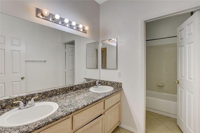1408 Reebok Ter, Henderson, NV 89014 - bathroom with double vanity, tile patterned flooring, washtub / shower combination, and baseboards
