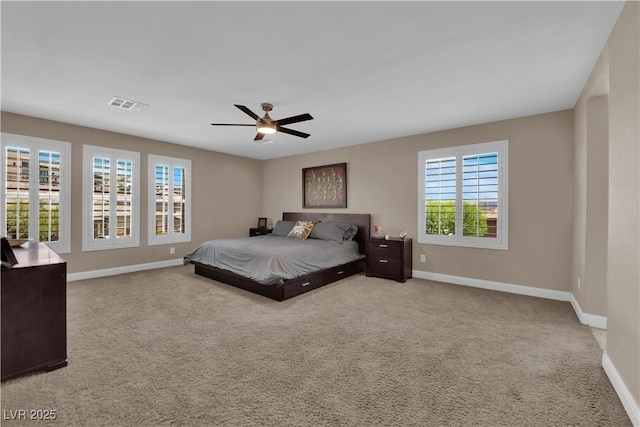 5542 Oak Bend Dr, Las Vegas, NV 89135 - carpeted bedroom with baseboards and a ceiling fan