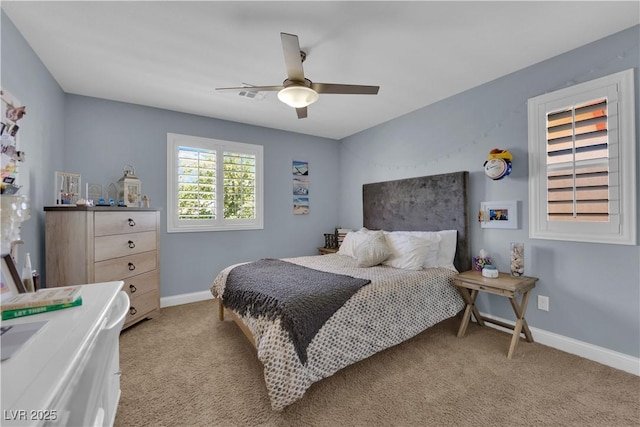 5542 Oak Bend Dr, Las Vegas, NV 89135 - bedroom with light colored carpet and a ceiling fan