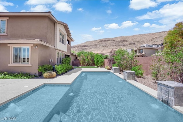 5542 Oak Bend Dr, Las Vegas, NV 89135 - view of swimming pool with a mountain view and a fenced backyard