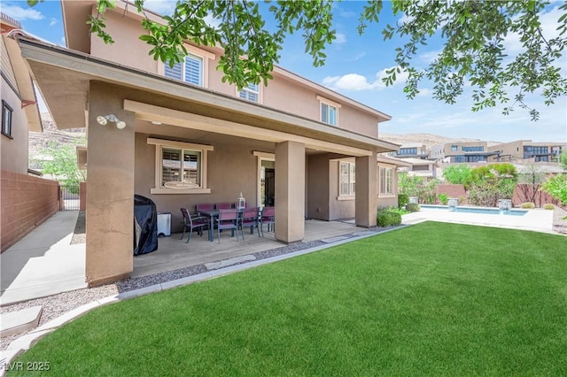 5542 Oak Bend Dr, Las Vegas, NV 89135 - rear view of house featuring stucco siding, a patio area, and a gate