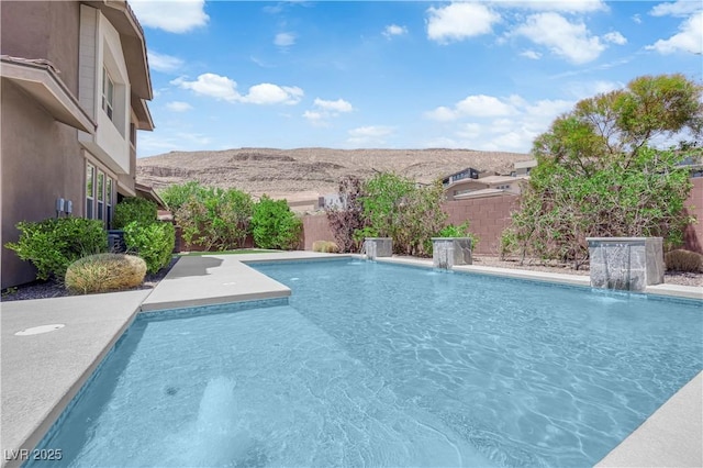 5542 Oak Bend Dr, Las Vegas, NV 89135 - view of pool with a fenced backyard and a mountain view