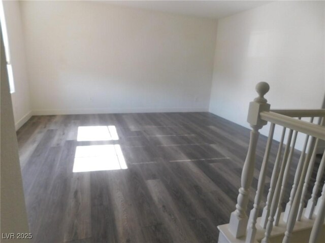 11173 Hickory Glen St, Las Vegas, NV 89179 - spare room featuring wood finished floors and baseboards