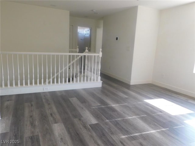 11173 Hickory Glen St, Las Vegas, NV 89179 - spare room featuring baseboards and wood finished floors